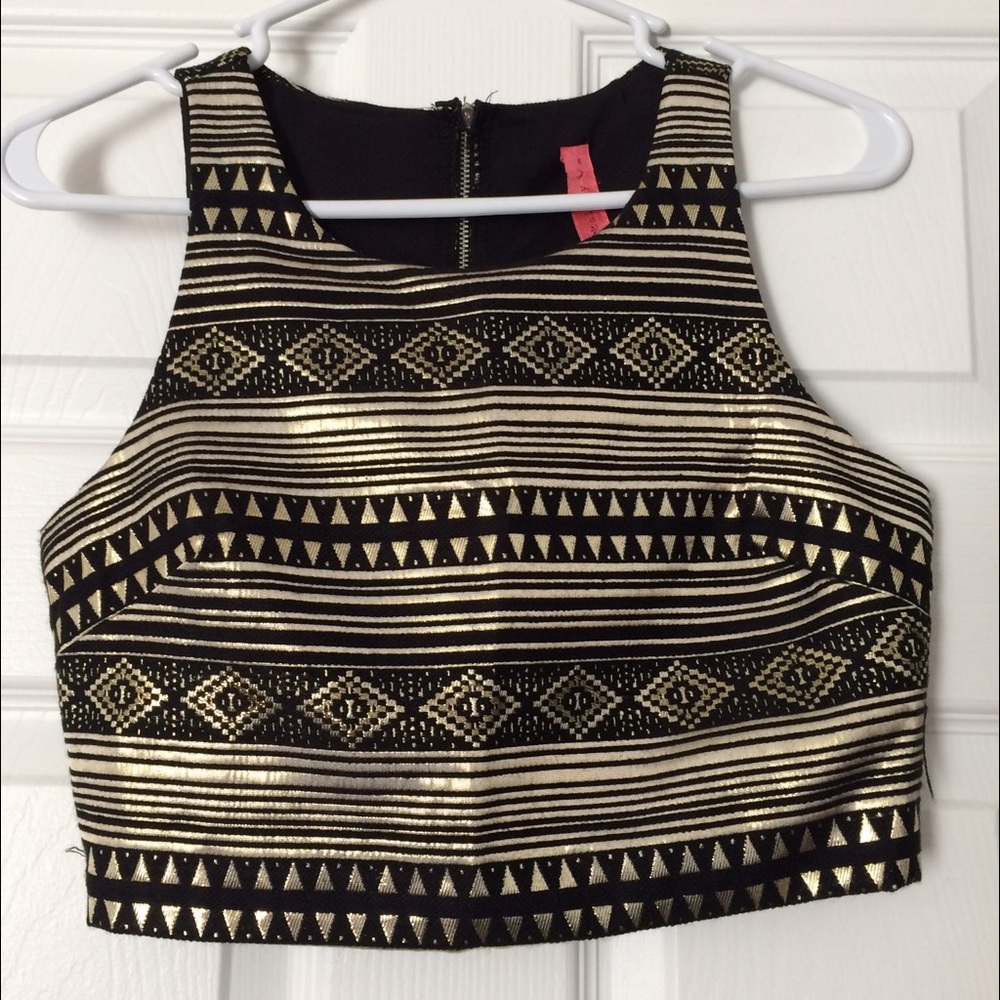 Black & gold crop top.