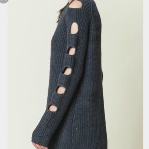 Soft sweater with cut out sleeve detail