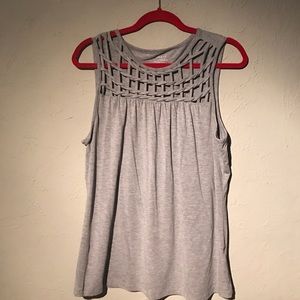 Gray sleeveless top.