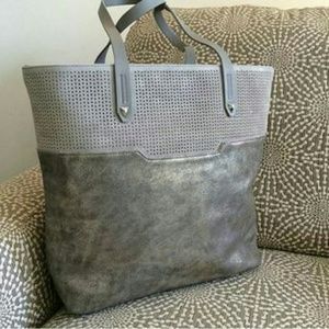 Metallic Stella and Dot tote and matching wristlet