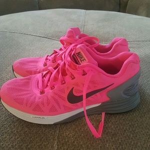 Pink Nike running shoes