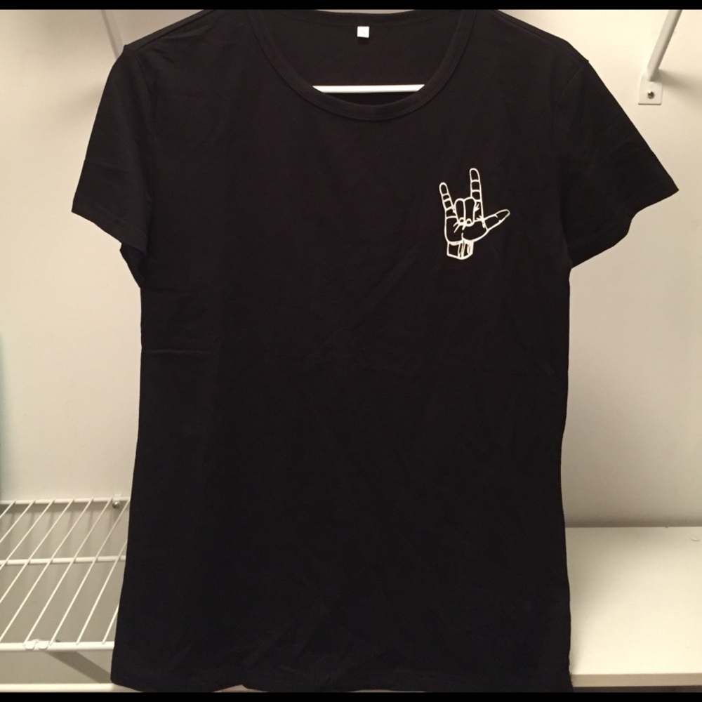 "Rock on" hand sign tee.