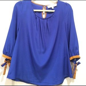 Francesca's tunic jewel neck shirt.