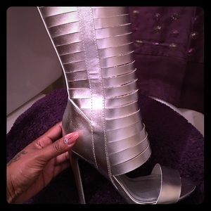 Silver knee high heels