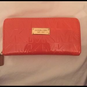 Michael Kors patent orange leather wallet