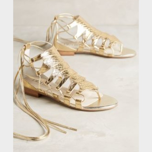 Anthropologie Shoes - NWT Anthropologie Embossed Metallic Gladiator gold