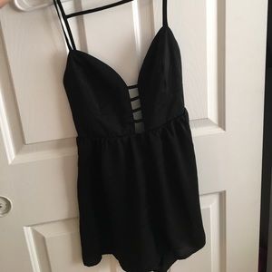 Black Romper with strappy back!