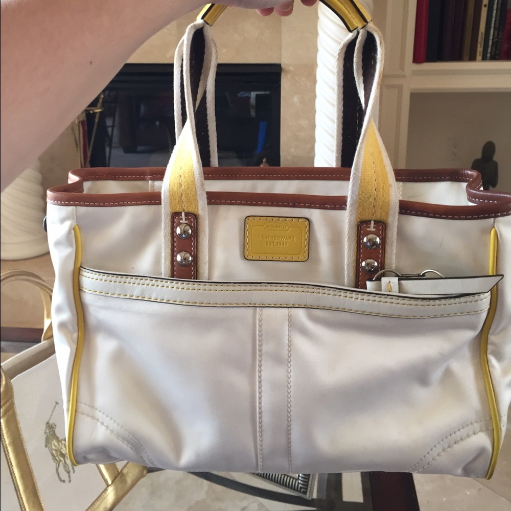 White and yellow coach tote