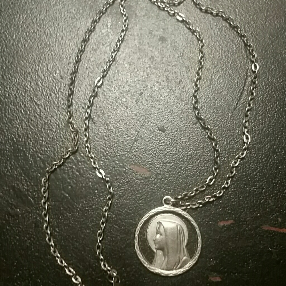Silver tone cut out Virgin Mary necklace