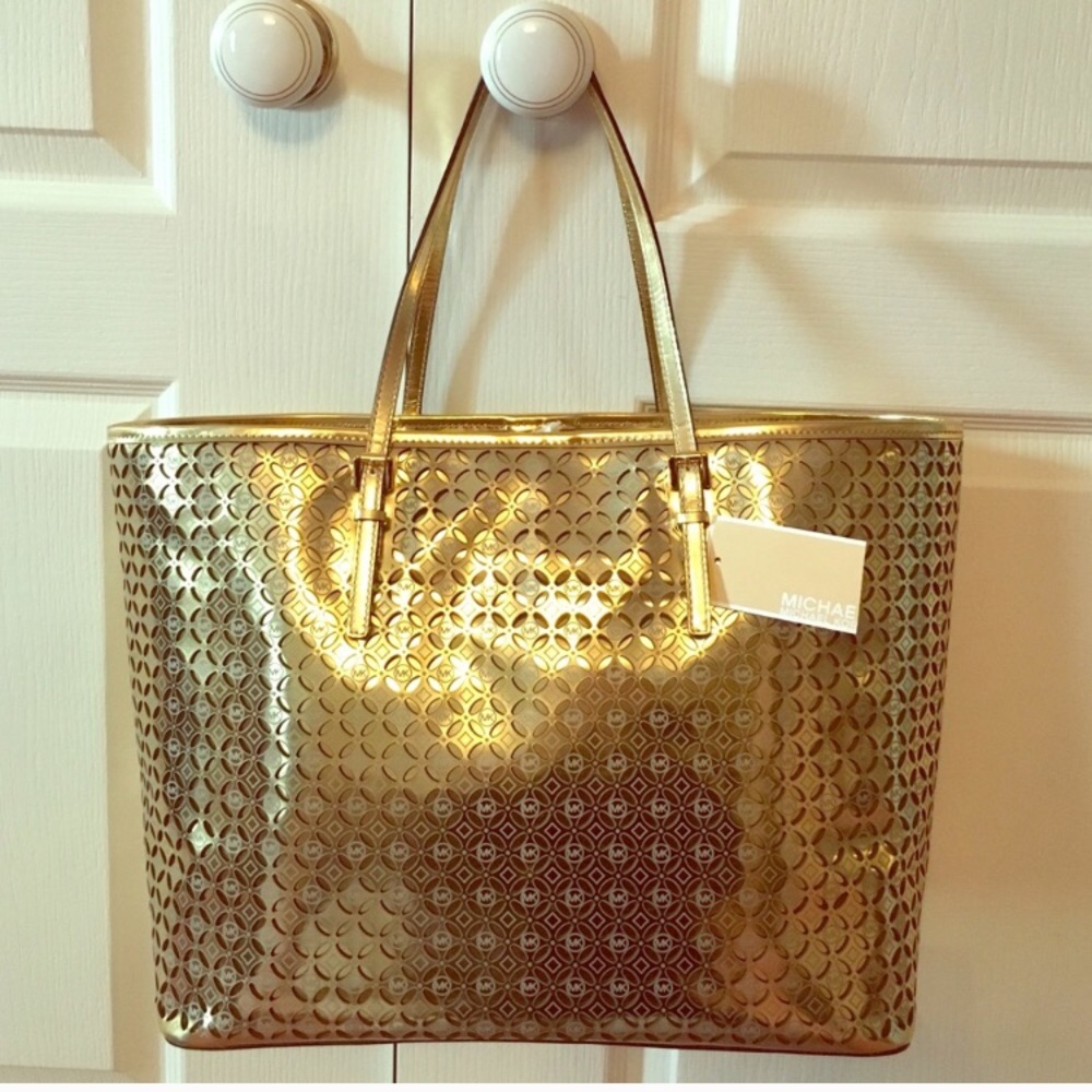 Michael Kors new gold tote. Genuine leather.
