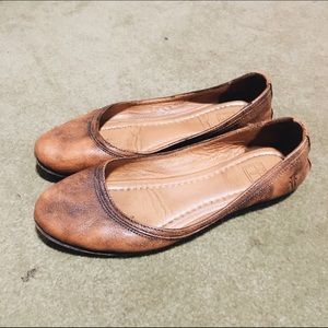 Brown leather flats