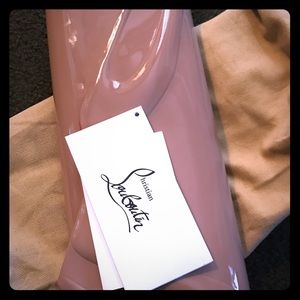Christian Louboutins nude clutch