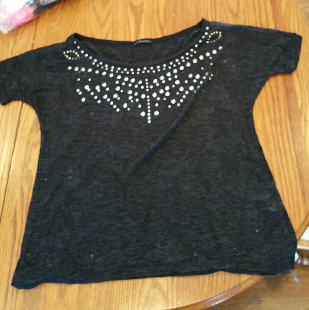Off the shoulder black shirt with embellishments