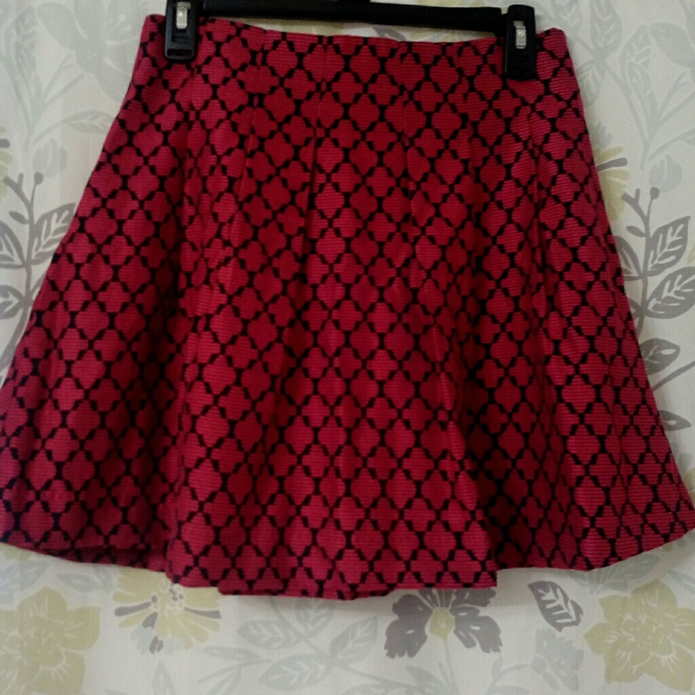 A fine and beautiful red and black skirt