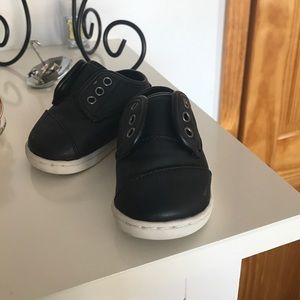 Baby shoes. Black