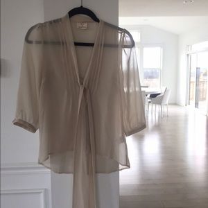 Urban Outfitters sheer cream blouse