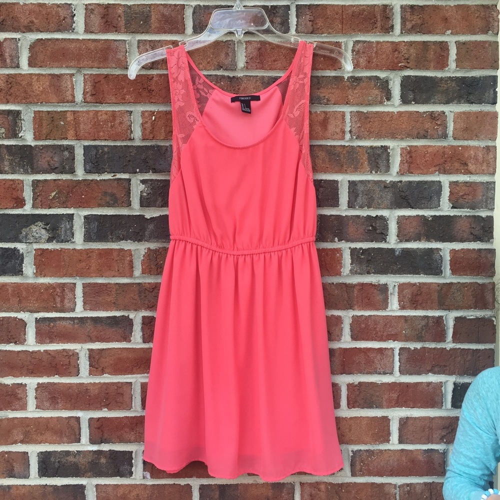 Coral dress with lace detailing