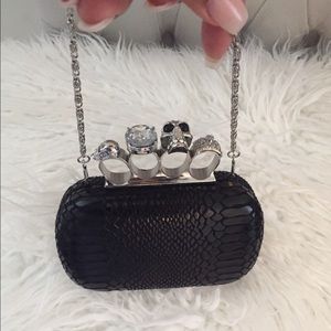 Black snakeskin/skull clutch