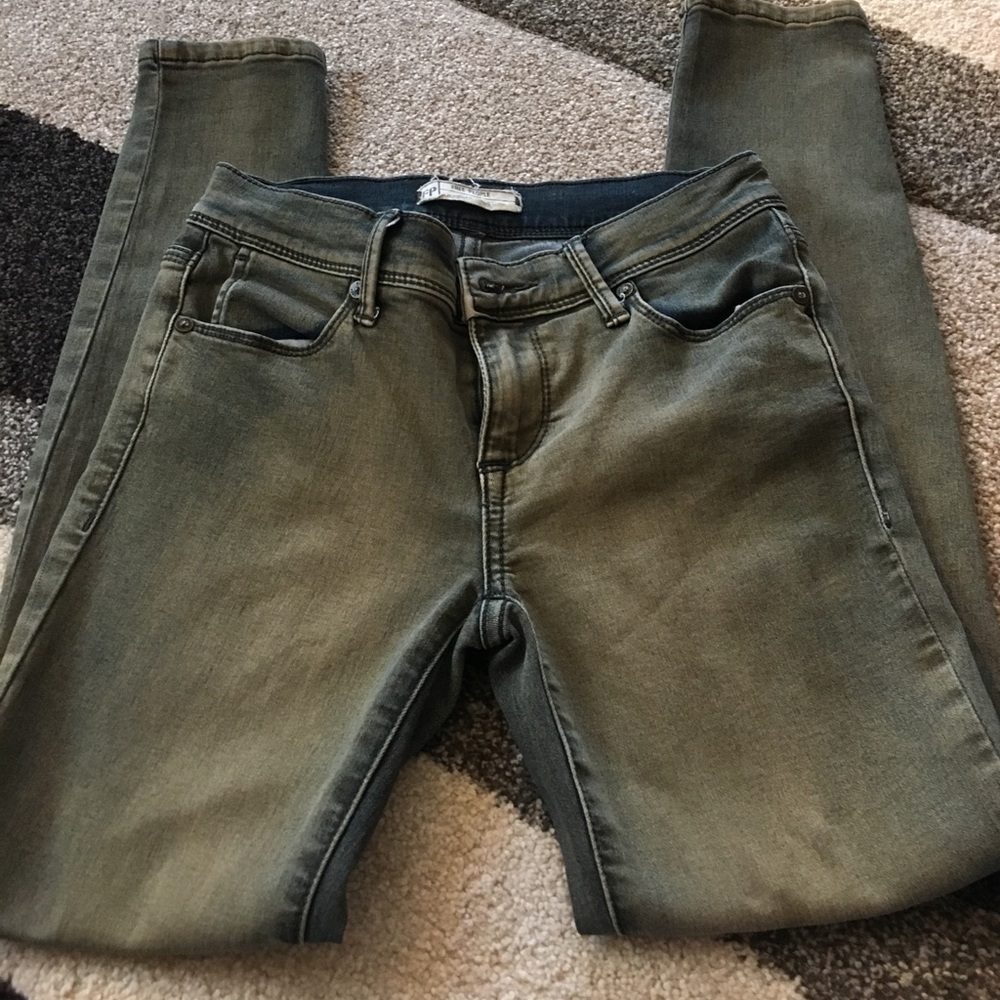 Free People faded green skinny jeans