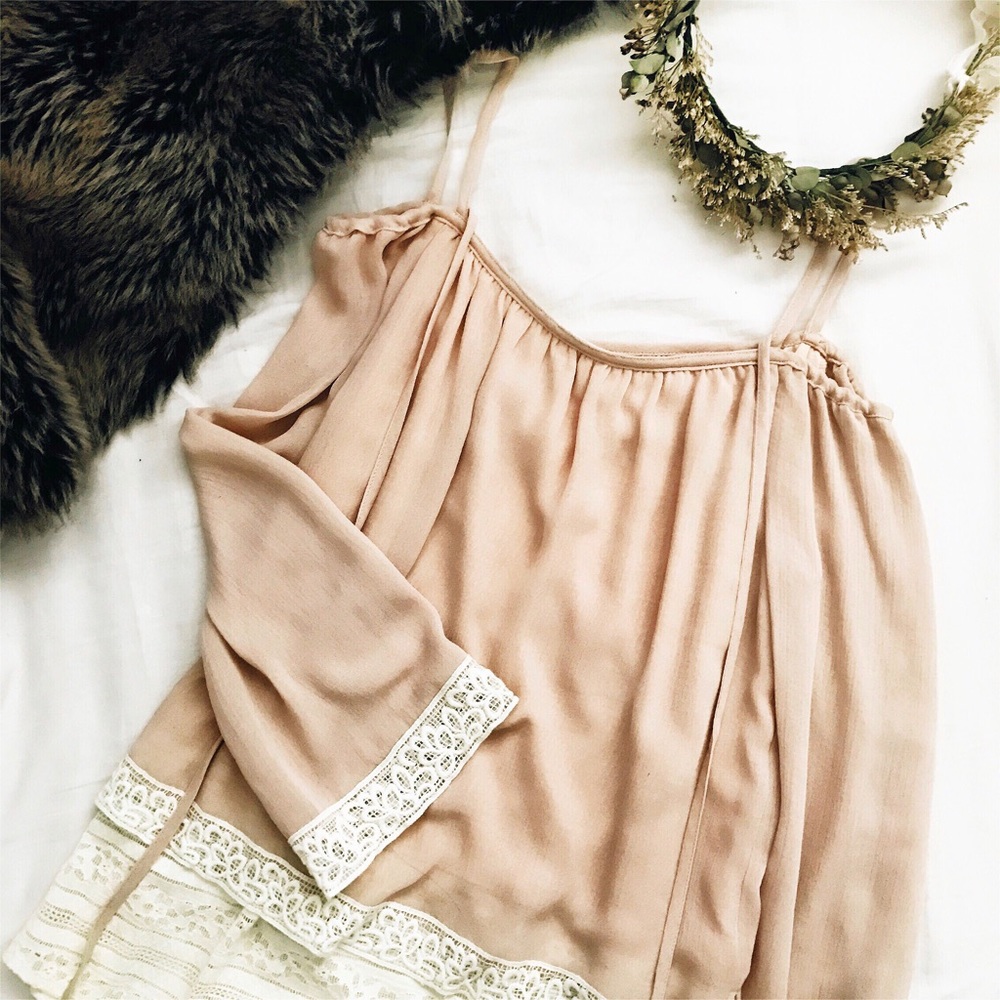 SOLD.NWOT. Off the shoulder Lace top.