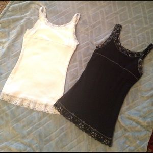 2 girls Justice tank tops