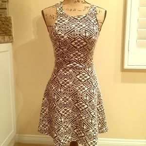 Printed mini dress with open back design