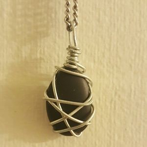 Wire wrapped black river rock necklace