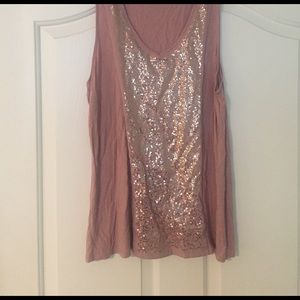 Beige top with sparkle almost a mauve color