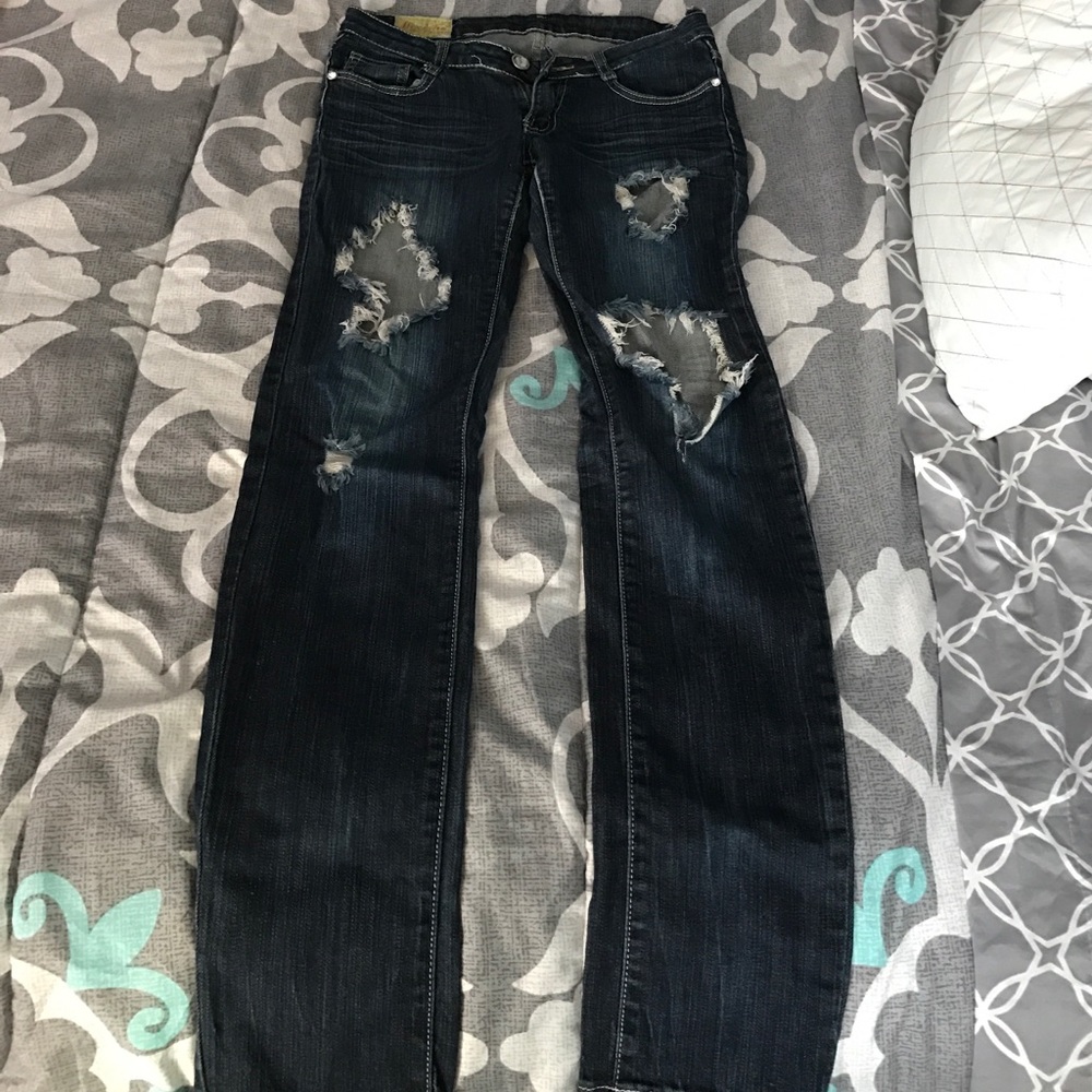 Machine, distressed denim, slight flaw, dark wash