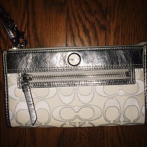 Silver COACH wristlet