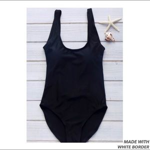 Low back, black one piece swimsuit. Wire free.