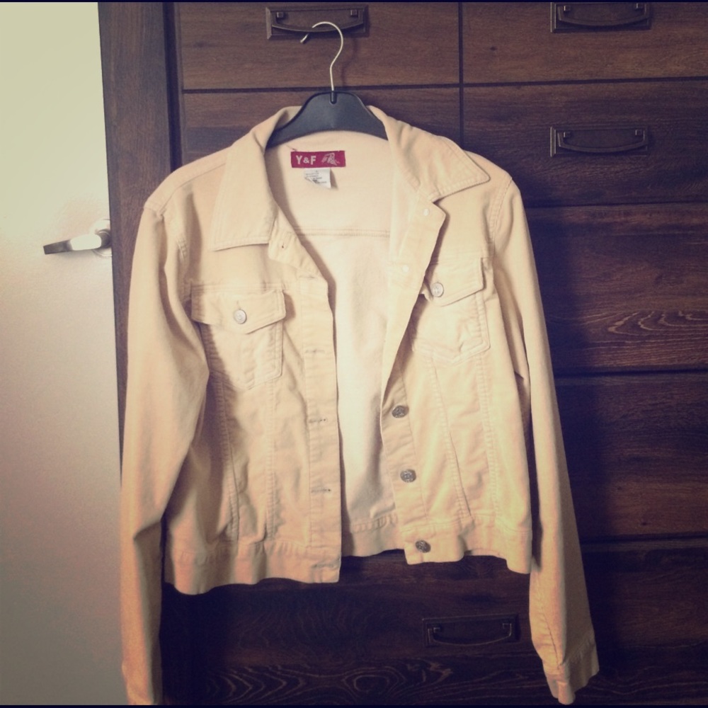 A beige overtop jacket