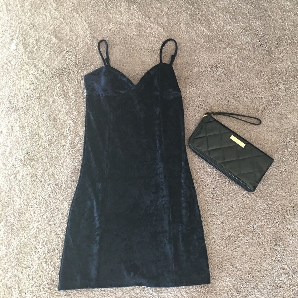 Dark navy velvet mini dress from Urban Outfitters.