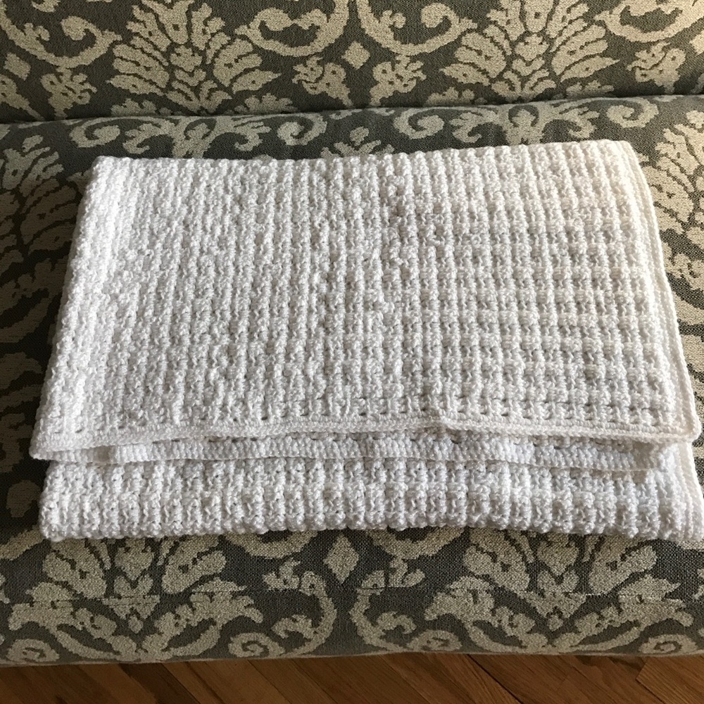Gorgeous white crocheted baby blanket