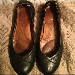 Black leather flats