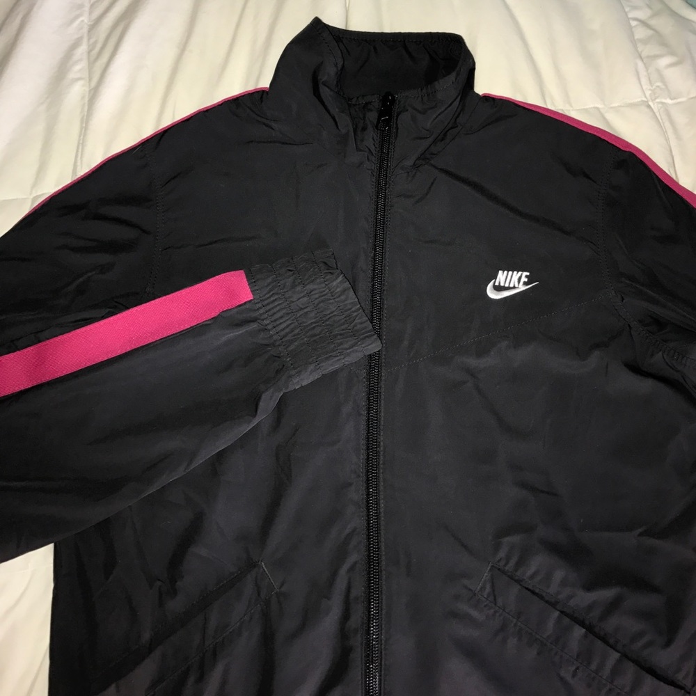 black nike windbreaker with pink stripe