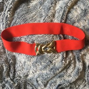 Red and gold elastic hook belt.