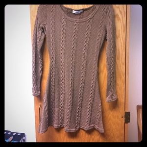 A casual long sleeve knitted dress