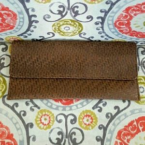 Brown faux leather clutch with removable strap