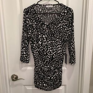 Jennifer Lopez Black Top with Woven Detail