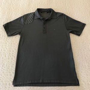 Men's Travis Mathew short sleeved golf shirt.