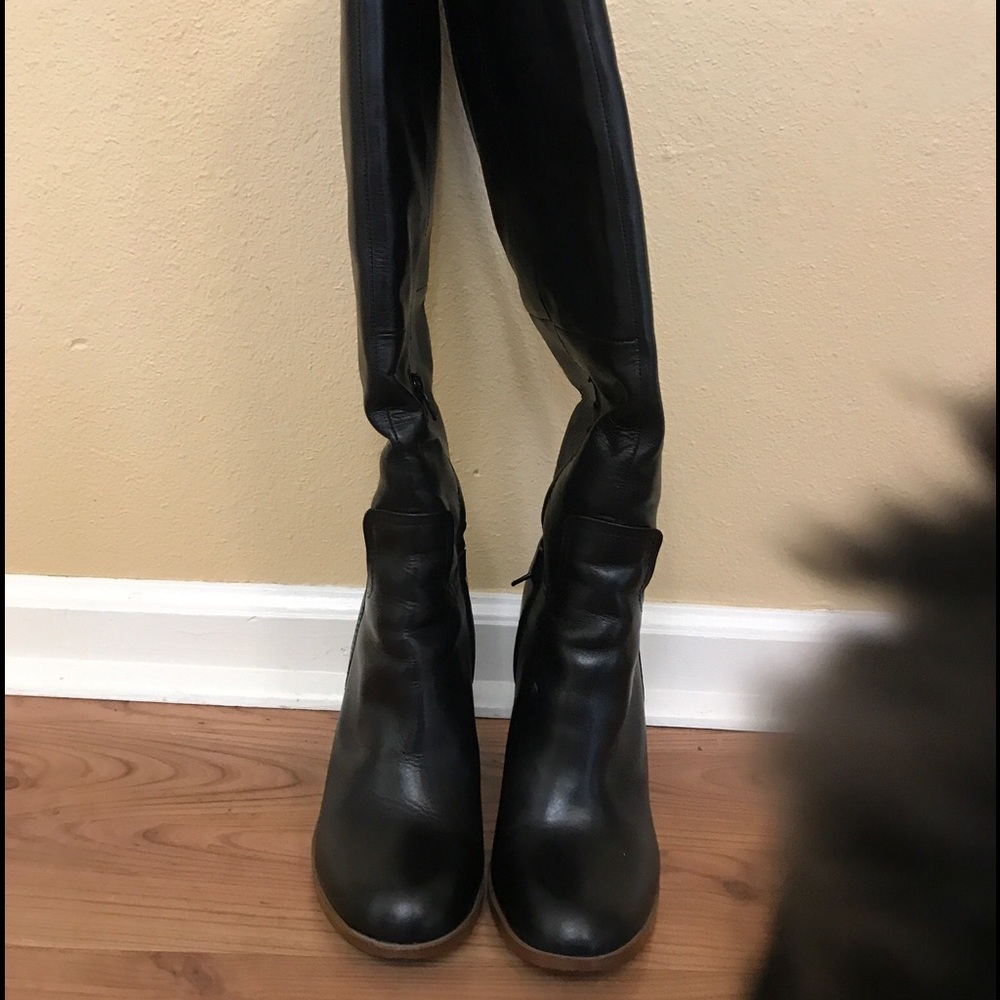Aldo knee high black leather boots.