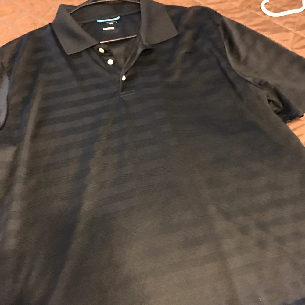 Black xl Nike golf shirt. Dry fit material.
