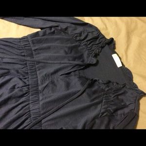 Navy ruffle blouse, flattering waist