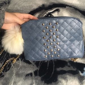 Gold chain cross body purse with fluffy ball