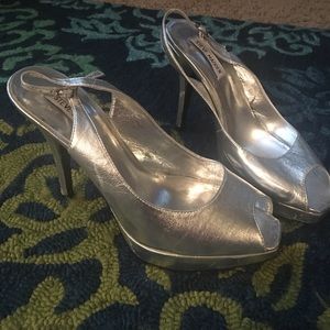 Silver peep toe sling back pumps