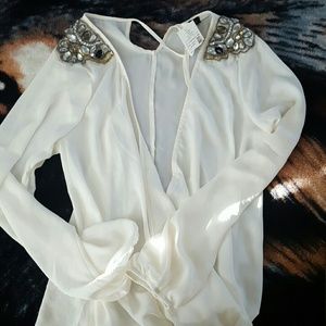Long sleeve top with jewels on shoulders