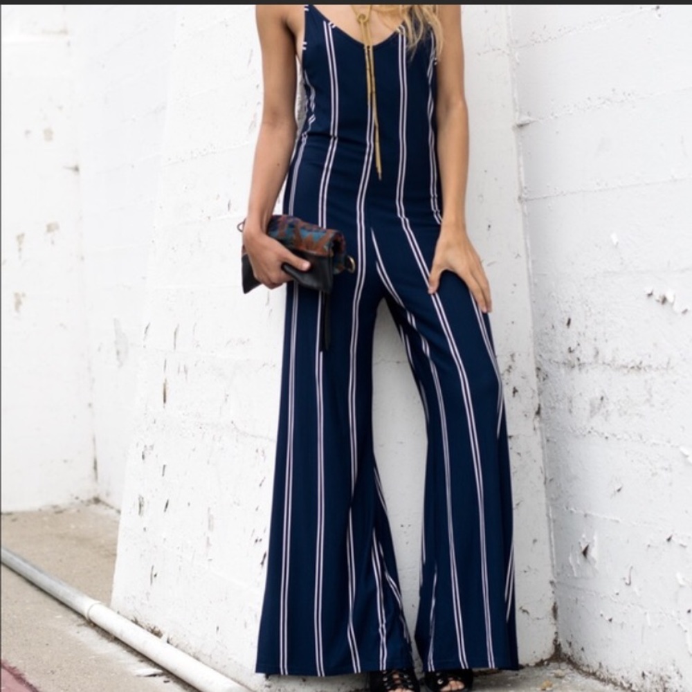 Stripped olivaceous romper size m.