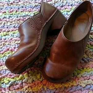 Tan Dansko clogs