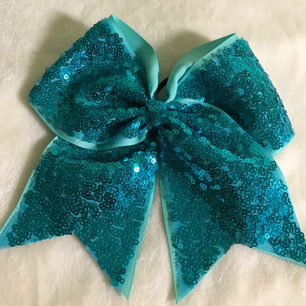 Teal sequence cheer bow.